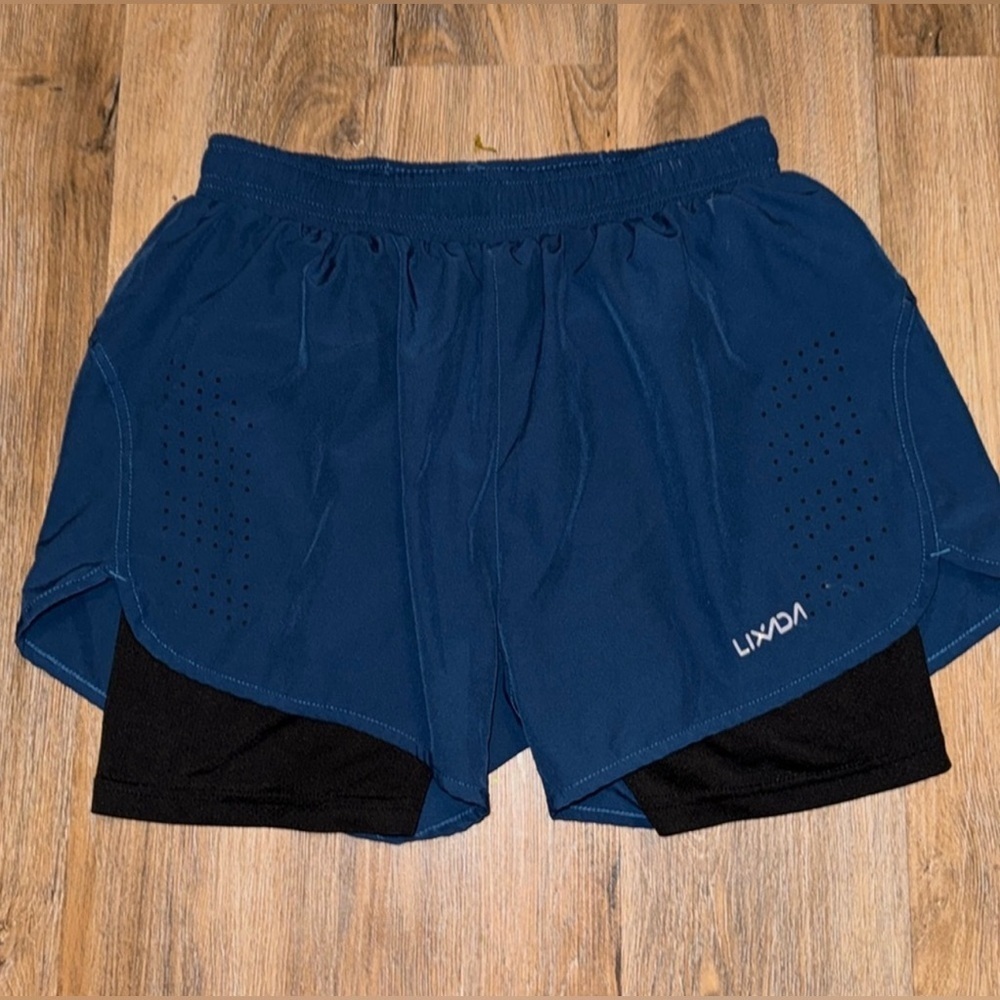 Running shorts with built in compression shorts (blue on top of black)